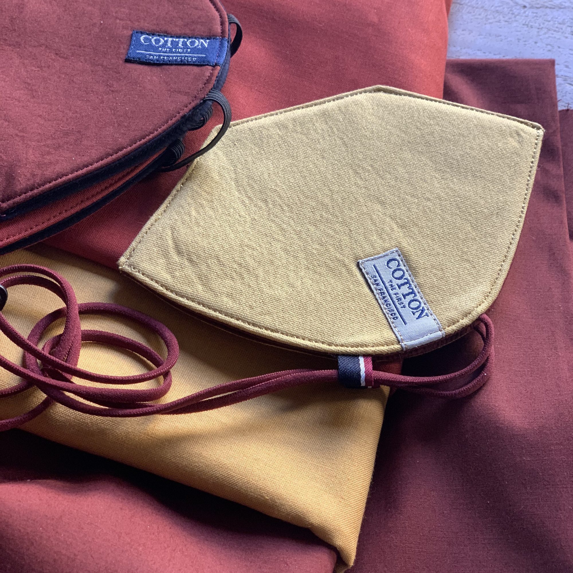 Tan and burgundy colorway masks